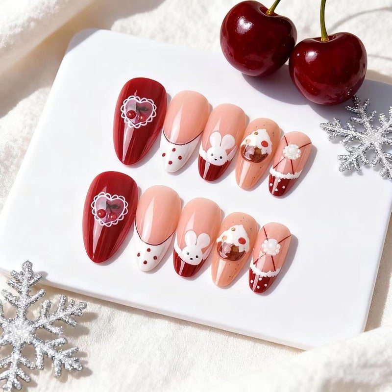 SEENEEY Christmas Almond Press on Nails Medium Fake Nails Red Artificial Nail Cherry Designs Cute Stick on Nail for Women 24pcs - Image 1